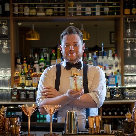 Clayton Hotel Dublin Airport Coolock Ngoại thất bức ảnh Bartender with a drink